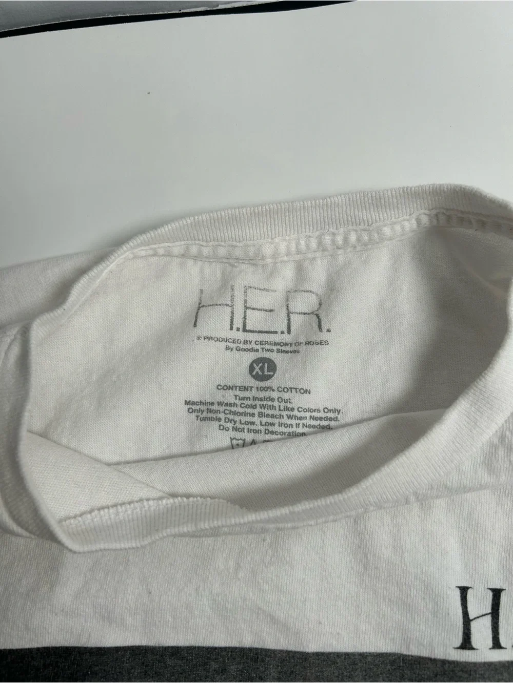 White Graphic Home Art Poster-Style Print Tee shirt of H.E.R.